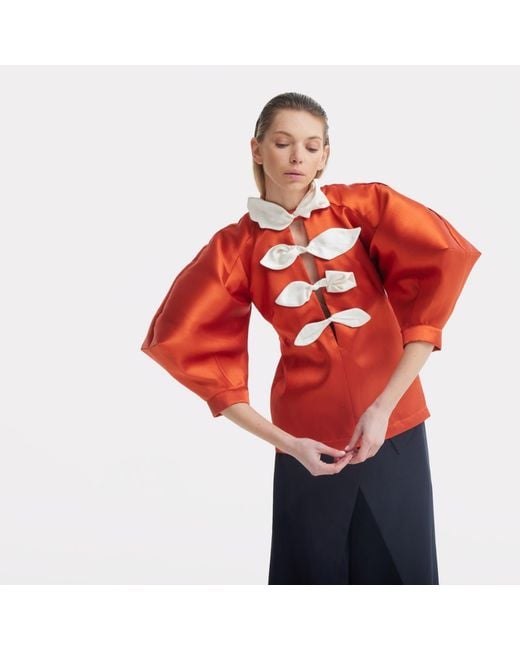Julia Allert Orange Taffeta Deep V-Neck Blouse With Satin Floral Detail – Terracotta