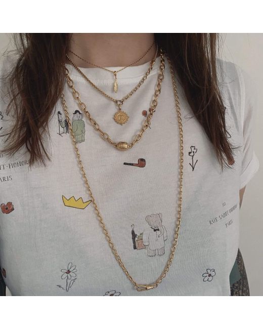 IN CAUDA VENENUM Metallic Lakshmi Necklace