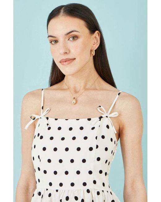 Yumi' Metallic Polka Dot Hankerchief Hem Dress