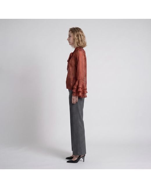 Modenaire Red Sheer Blouse With Tie Neck Detail And Bell Sleeves