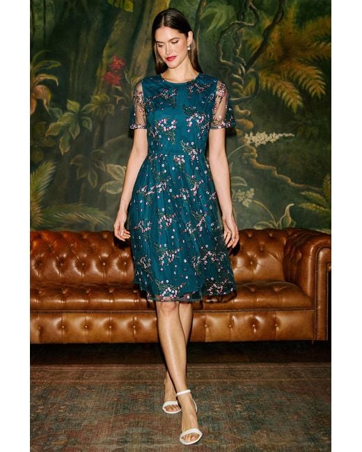 Yumi' Blue Embroidered Floral Mesh Prom Dress