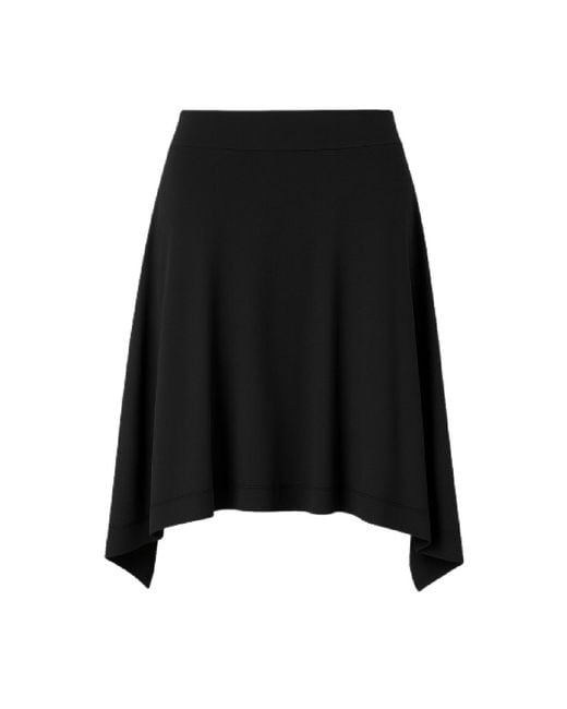 Conquista Black Asymmetric Flared Skirt – Modern, Flowy, Effortlessly Versatile