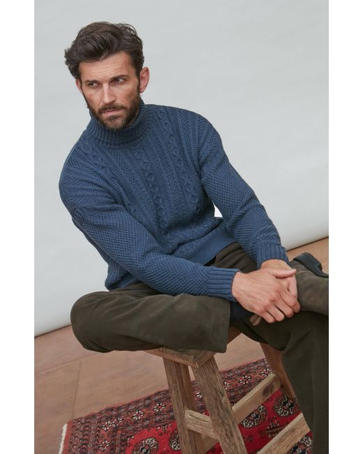 Paul James Knitwear Blue Midweight Cotton Aith Cable Roll Neck Gansey Jumper for men
