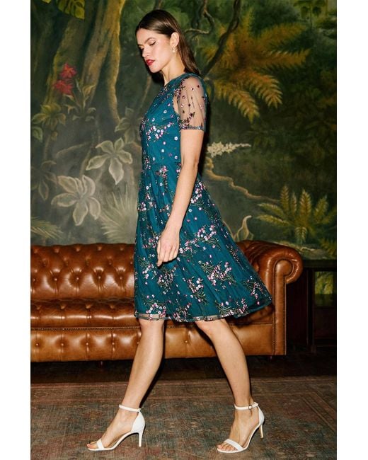 Yumi' Blue Embroidered Floral Mesh Prom Dress