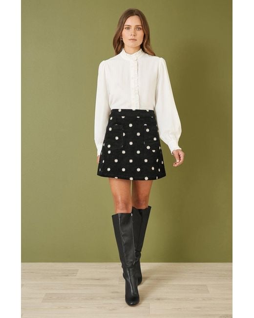 Yumi' Black Corduroy Embroidered Daisy Mini Skirt