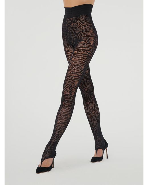 Trace Net Stirrup Tights, Femme, , Taille Wolford en coloris Black