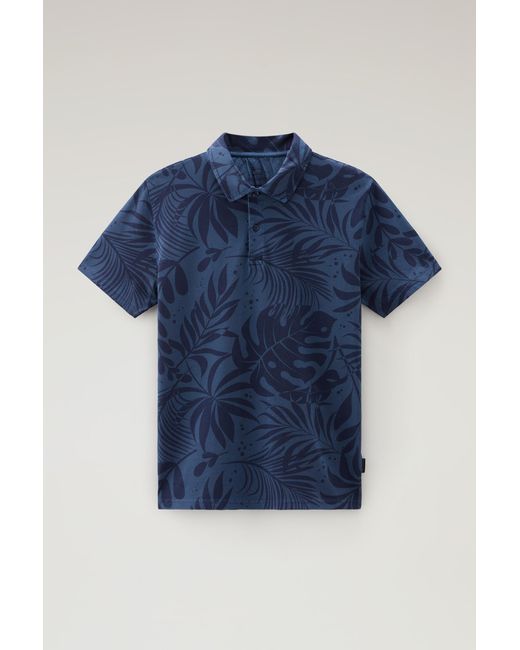 Woolrich Blue Garment-dyed Polo Shirt In Stretch Cotton With A Tropical Print for men