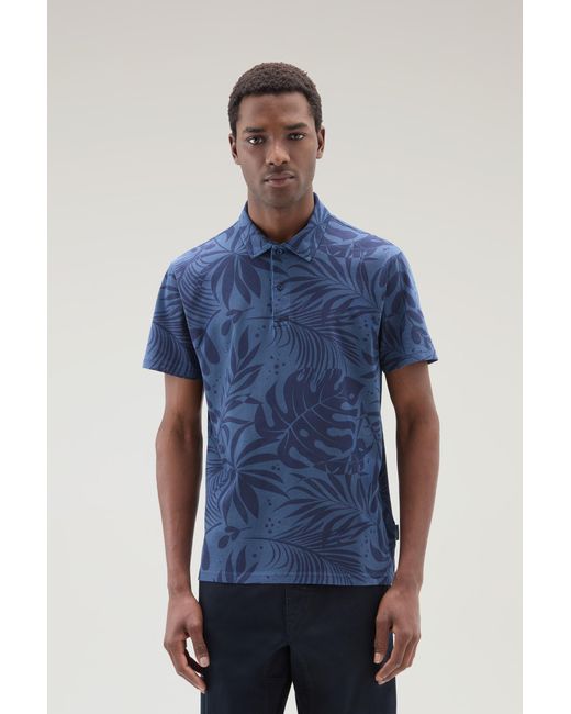 Woolrich Blue Garment-dyed Polo Shirt In Stretch Cotton With A Tropical Print for men