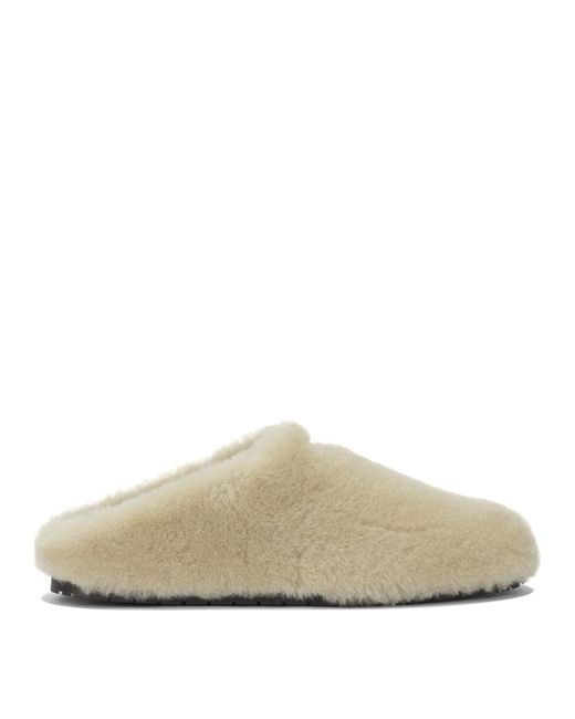 Prada White Sheepskin Sabots