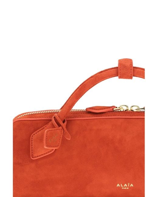 Alaïa Red Alaïa Le Teckel Clutch Brule