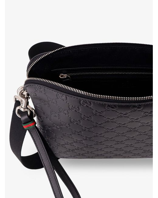 Gucci Black Leather Gg Emblem Crossbody Bag With Embossed Gg Motif for men
