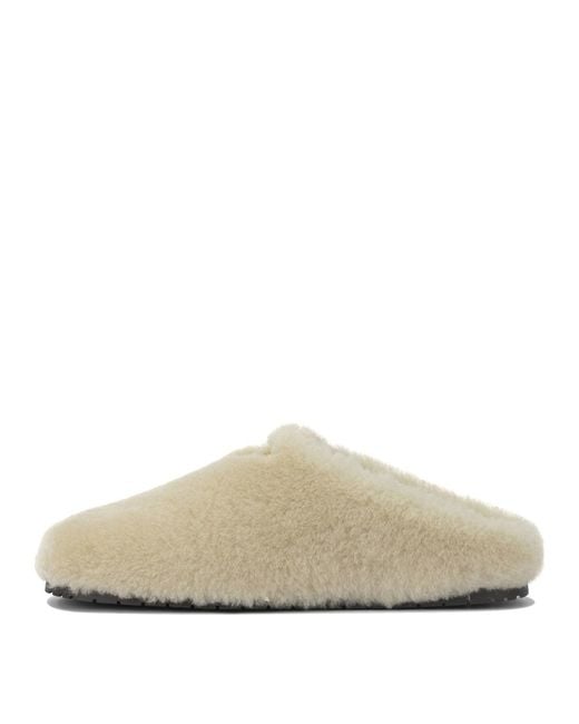 Prada White Sheepskin Sabots