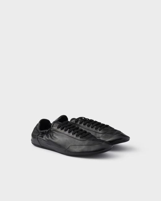 Prada White Collapse Leather Sneakers for men