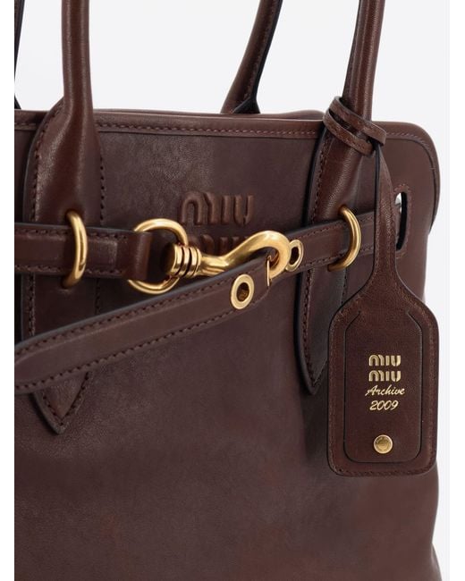 Miu Miu Brown Aventure Leather Handbag With Front Lettering Logo