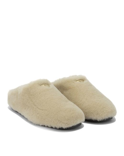 Prada White Sheepskin Sabots