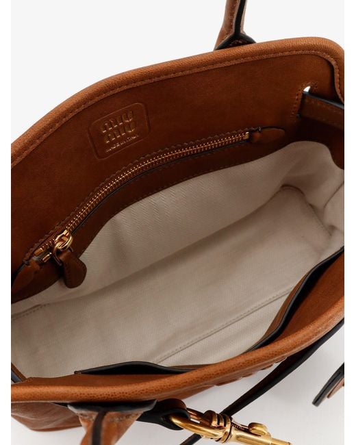 Miu Miu Brown Aventure Leather Handbag With Embossed Lettering Logo
