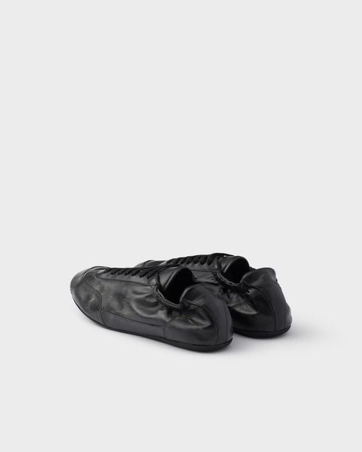Prada White Collapse Leather Sneakers for men