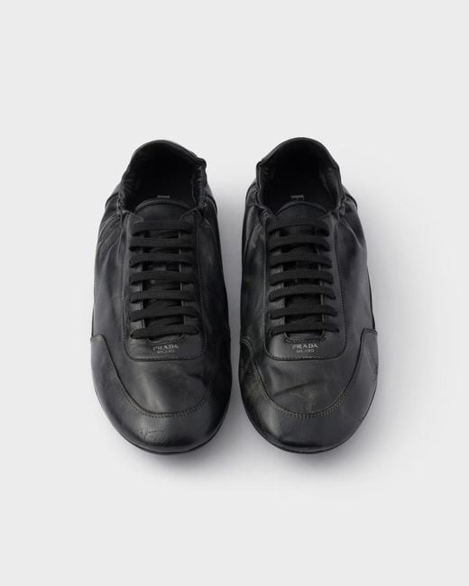 Prada White Collapse Leather Sneakers for men