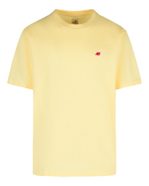 New Balance Yellow Cotton Polo Shirt Cream for men
