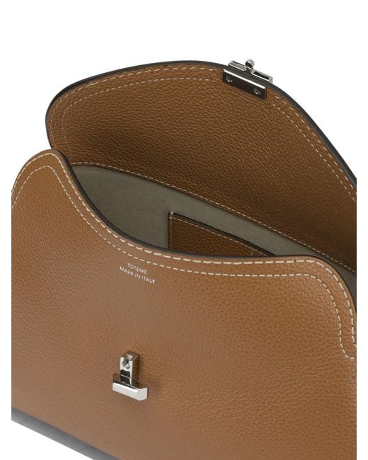 Totême  Natural T-Lock Clutch Bag