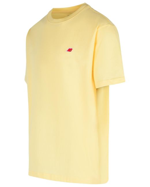 New Balance Yellow Cotton Polo Shirt Cream for men