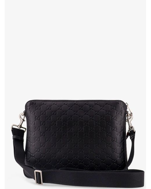 Gucci Black Leather Gg Emblem Crossbody Bag With Embossed Gg Motif for men