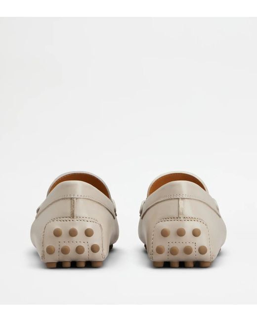 Tod's White "Gommino" Loafers
