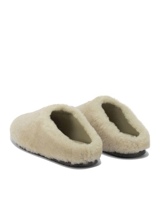 Prada White Sheepskin Sabots