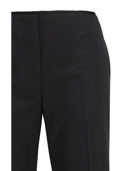 Totême  Black Kick Flare Raw-Edge Pants