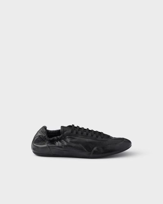 Prada White Collapse Leather Sneakers for men