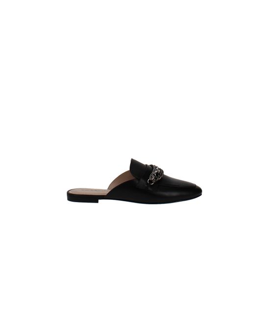 coach mules black