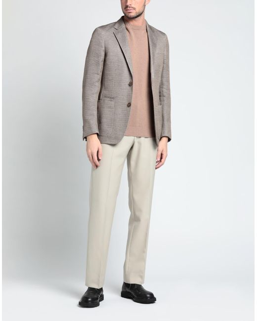 gray suit jacket with khakis