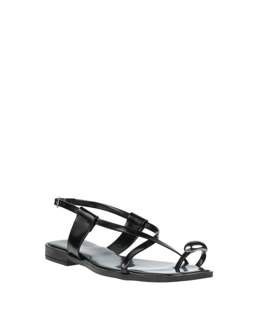 Ovyè Black Thong Sandals