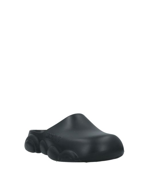 Moschino Black Mules & Clogs