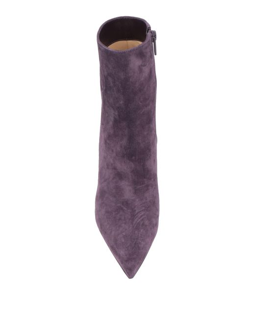 Botines de caña alta Christian Louboutin de color Purple