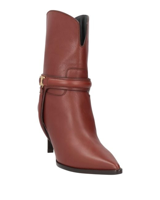 Bottines Céline en coloris Brown