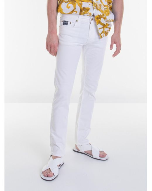 Jeans Slim di Versace in White da Uomo