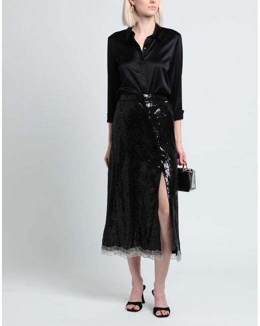 Jupe longue Koche en coloris Black