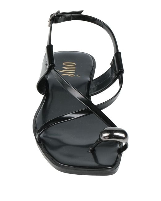 Ovyè Black Thong Sandals