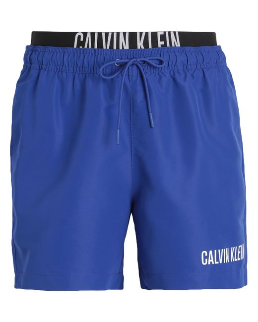 Short de bain Calvin Klein pour homme en coloris Blue