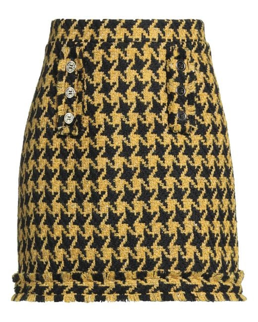 5 PROGRESS Yellow Mini Skirts