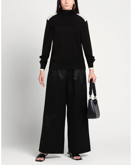 Erin Snow Black Jumper