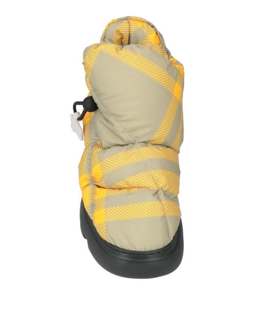 Botines de caña alta Burberry de color Yellow