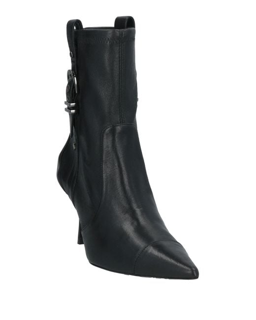Bottines Stuart Weitzman en coloris Black