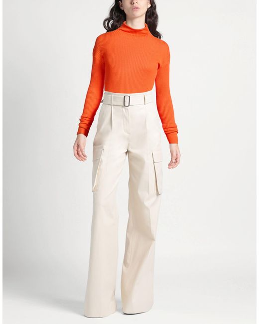 Lis Lareida Orange Turtlenecks