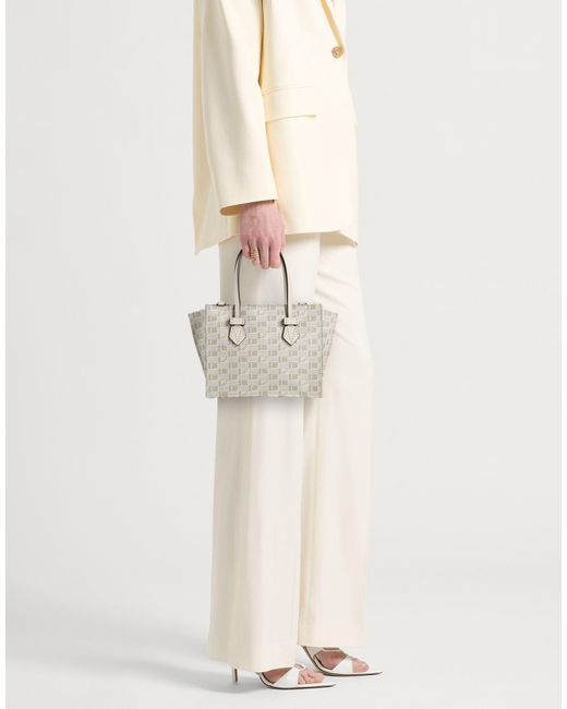 Moreau Paris White Handbags