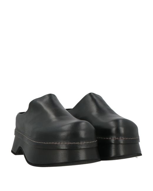 McQueen Black Mules & Clogs