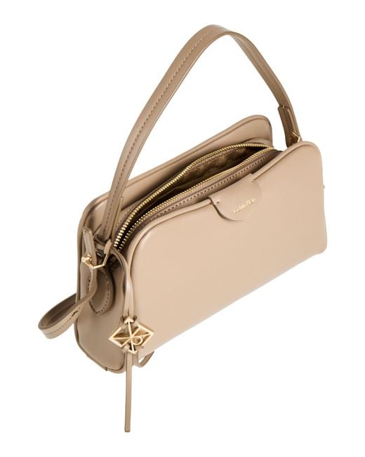 Calvin Klein Natural Handbags