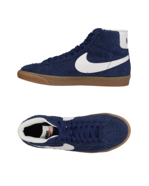 black and blue nikes high tops