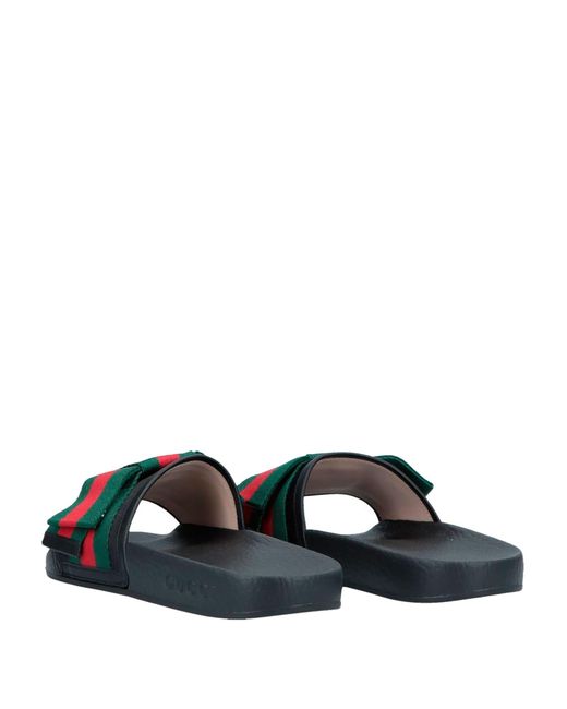 Gucci flat pursuit hot sale slide with bow